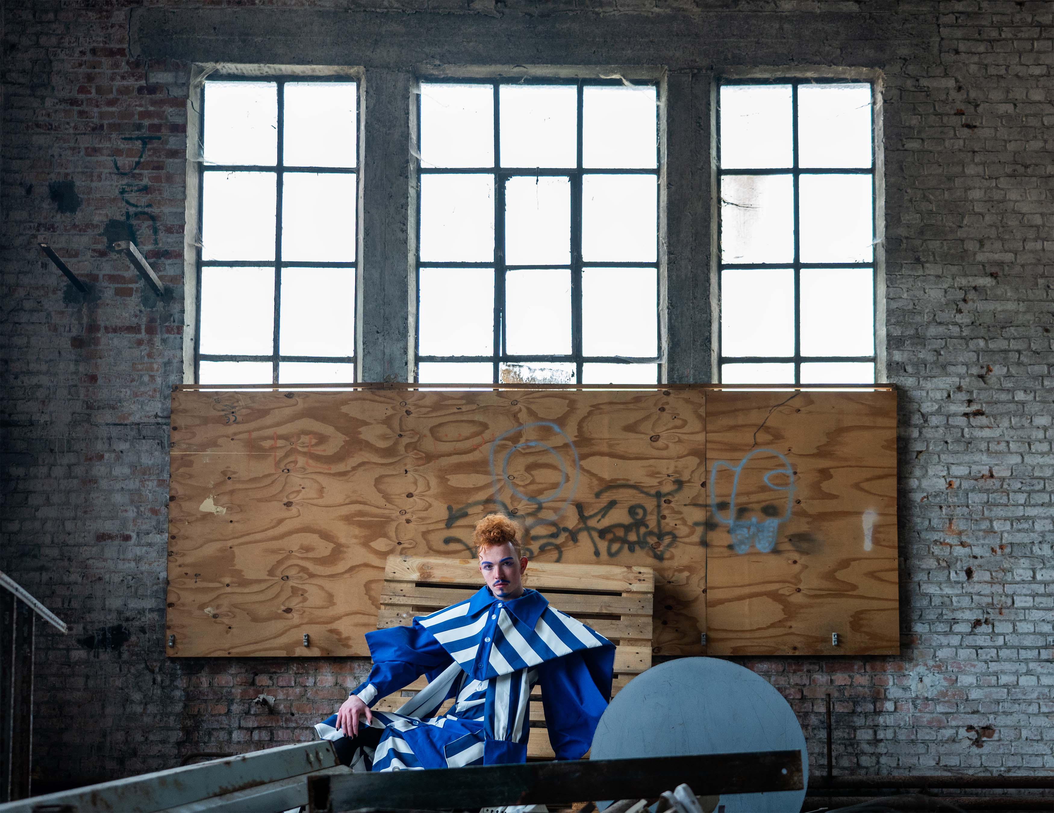 A Toyota Previa covered in graffiti